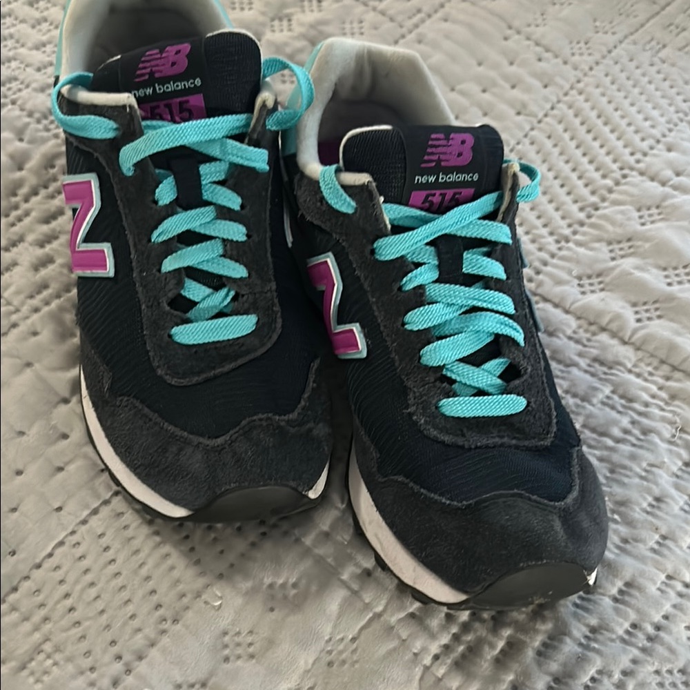 New Balance women’s' Black and Purple Sneakers